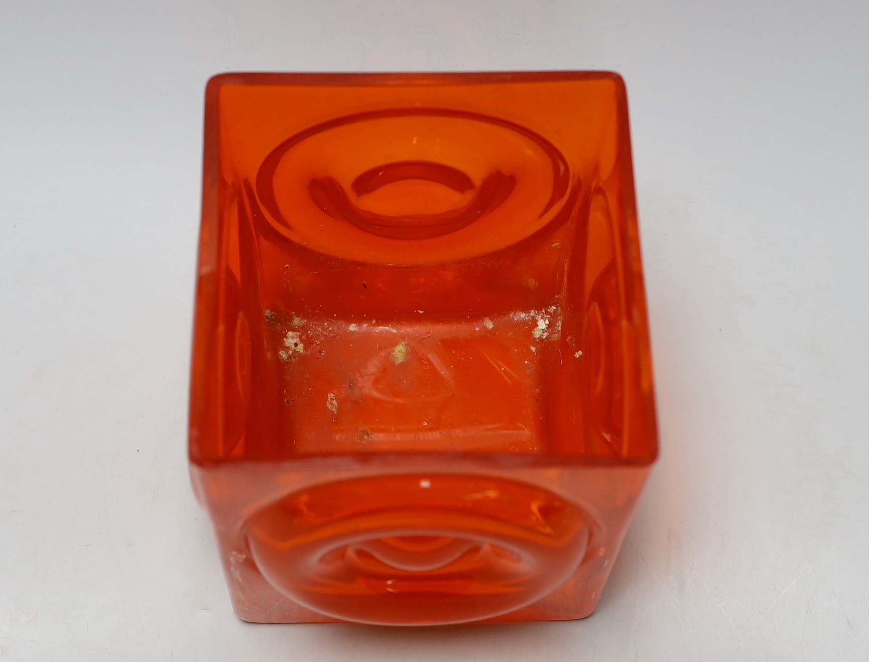 A 1970's tangerine glass vase, 16cms square